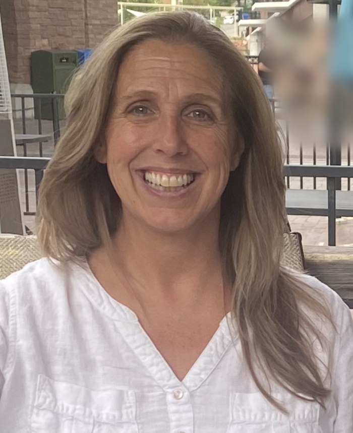 Luigina Dzenutis smiling